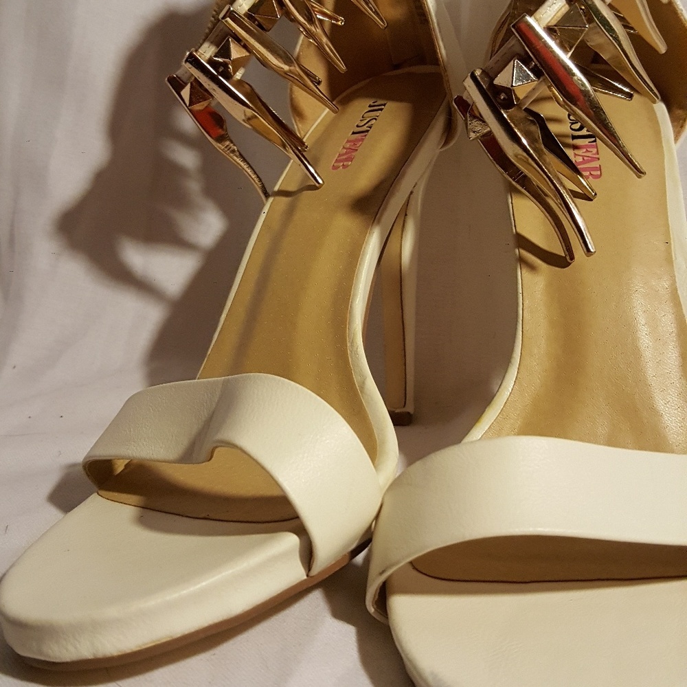 Cream heels with gold spikes